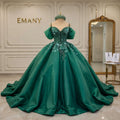  Full front view of the Amara emerald green ballgown with crystal details and cape by EMANY.