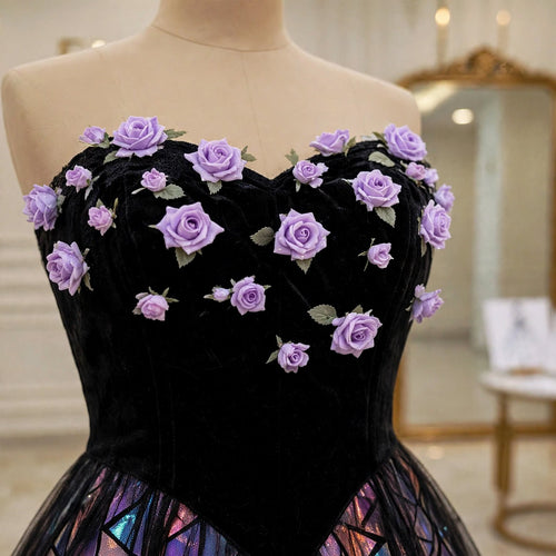 Close-up of the black velvet bodice with 3D purple roses and the holographic skirt on the Aurora gown by EMANY.