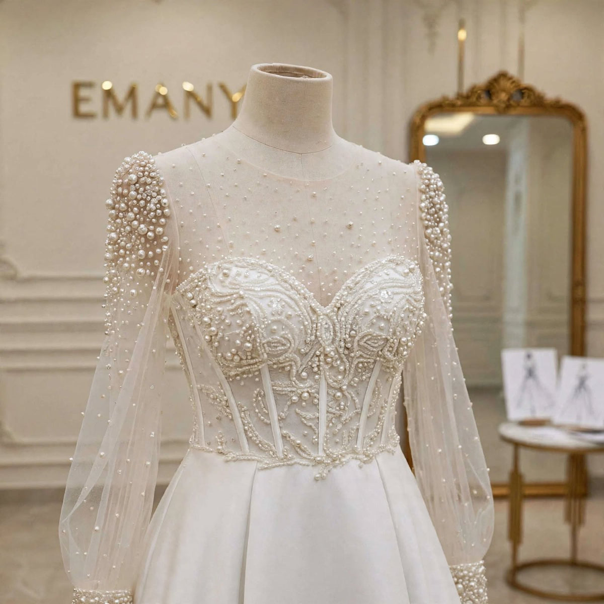 Close-up of the pearl-encrusted corset bodice and illusion neckline on the Rosalind bridal gown.