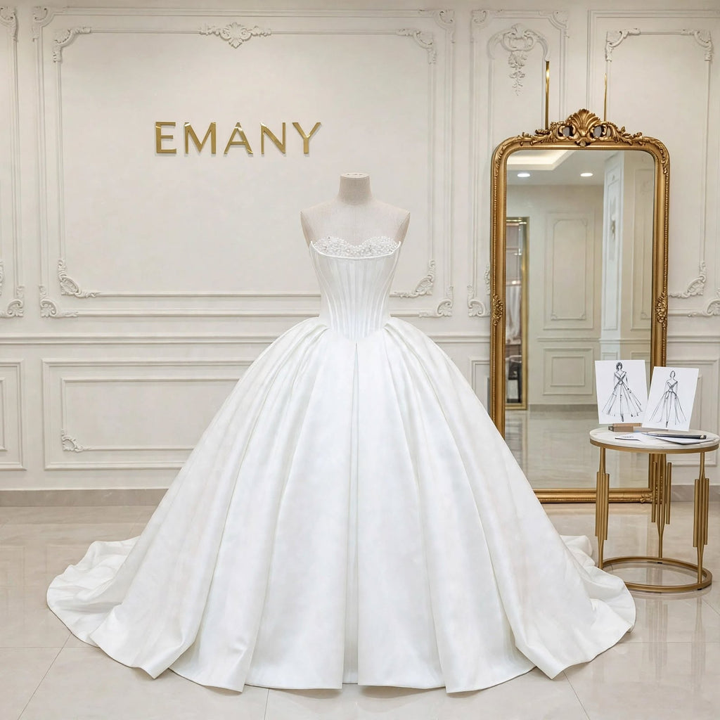 Full front view of the Selene luxury satin ballgown wedding dress with spaghetti straps and pleated skirt.
