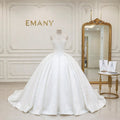 Full front view of the Selene luxury satin ballgown wedding dress with spaghetti straps and pleated skirt.